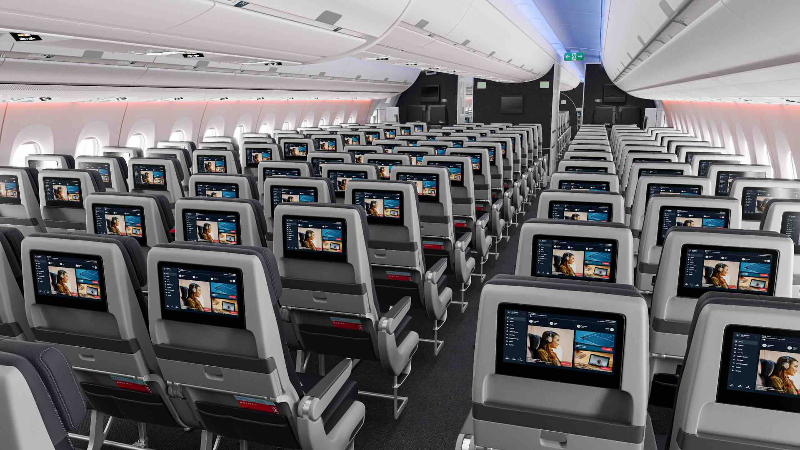 Delta Airlines interior, in economy class. Showing rows of seats on an aircraft.